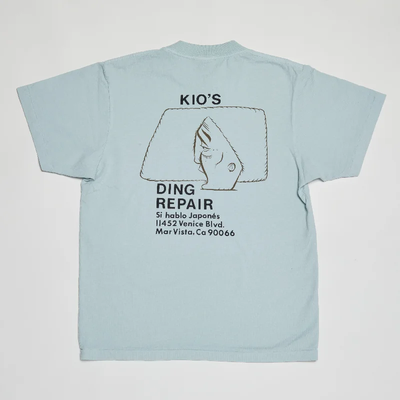 Kio’s Ding Repair 5th Generation T-Shirt (Dusty Blue)